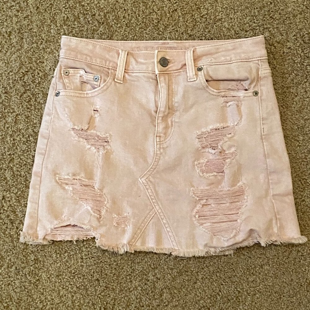 American Eagle denim min jean skirt pink distressed rips super stretch size: 0